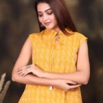 Mustard Yellow Ikat Printed Sleeveless Cotton Top for Women ? Trendy Summer Wear